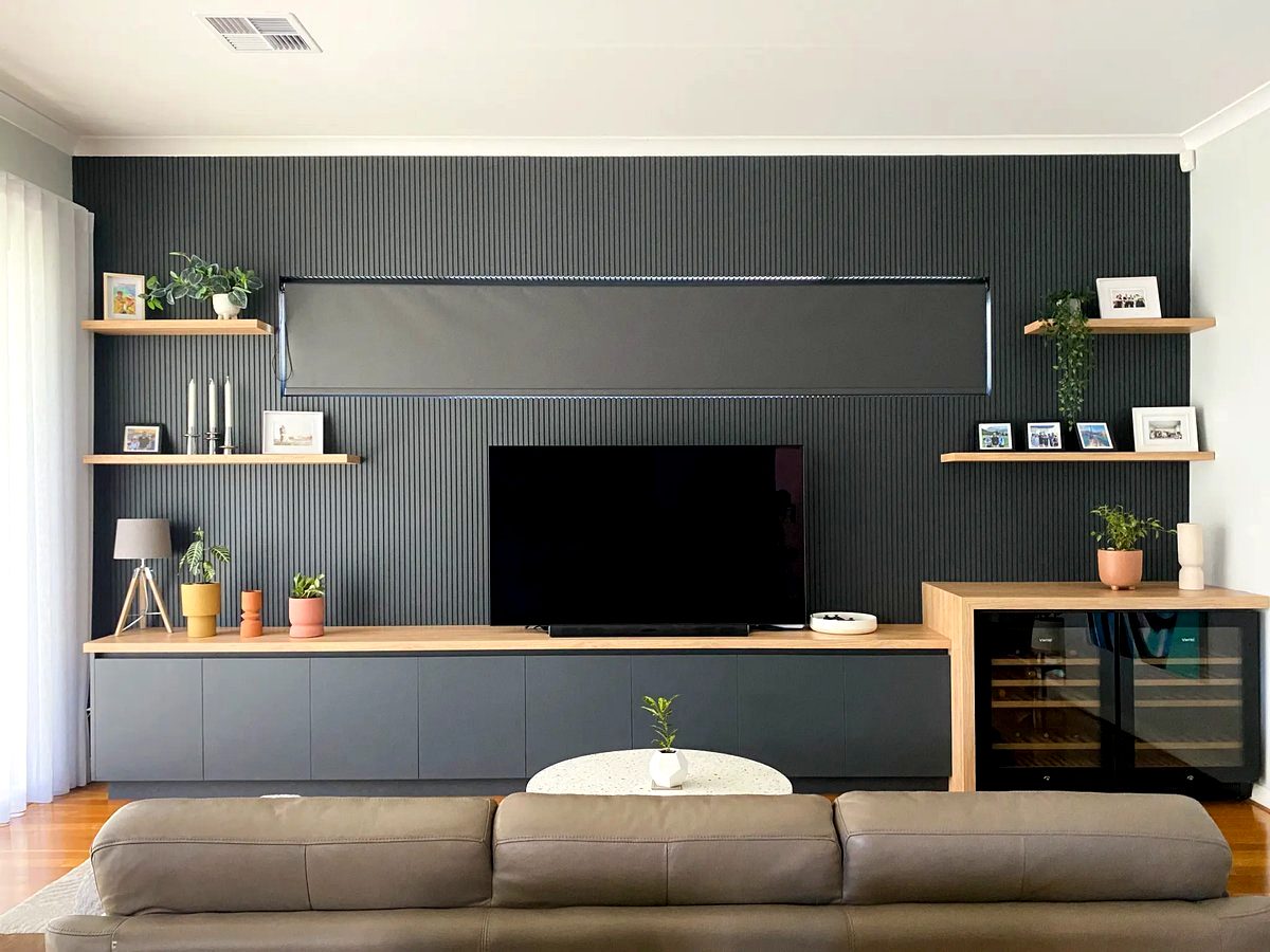 Best home builder Perth interior design showcasing custom feature wall, entertainment unit, and built-in cabinetry for modern living room